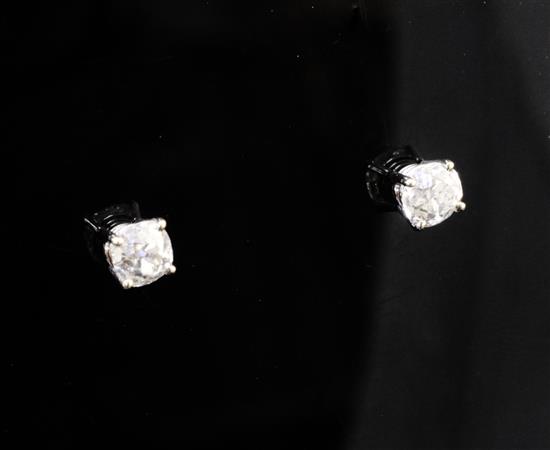 A pair of 18ct gold and solitaire diamond ear studs,